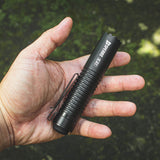 SPERAS E21 everyday carry flashlight resting in palm showing compact dimensions