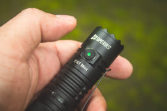 User operating the responsive side switch of the SPERAS EST Mini 1900lm everyday carry flashlight