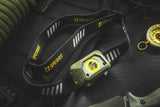 SPERAS B9 600-lumen outdoor hiking headlamp with bright spotlight active on tactical gear