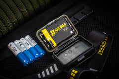 SPERAS B9 headlamp dual fuel battery system showing LC12 rechargeable pack and AAA batteries compatibility