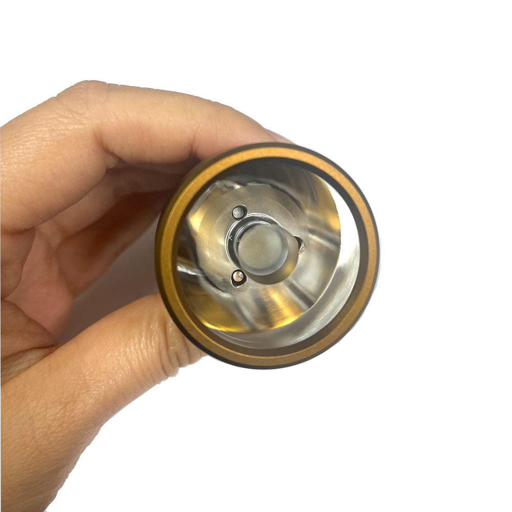 Front face of the SPERAS M4 flashlight showing the custom high-transmittance PMMA TIR lens and advanced Luminus SFT40 LED