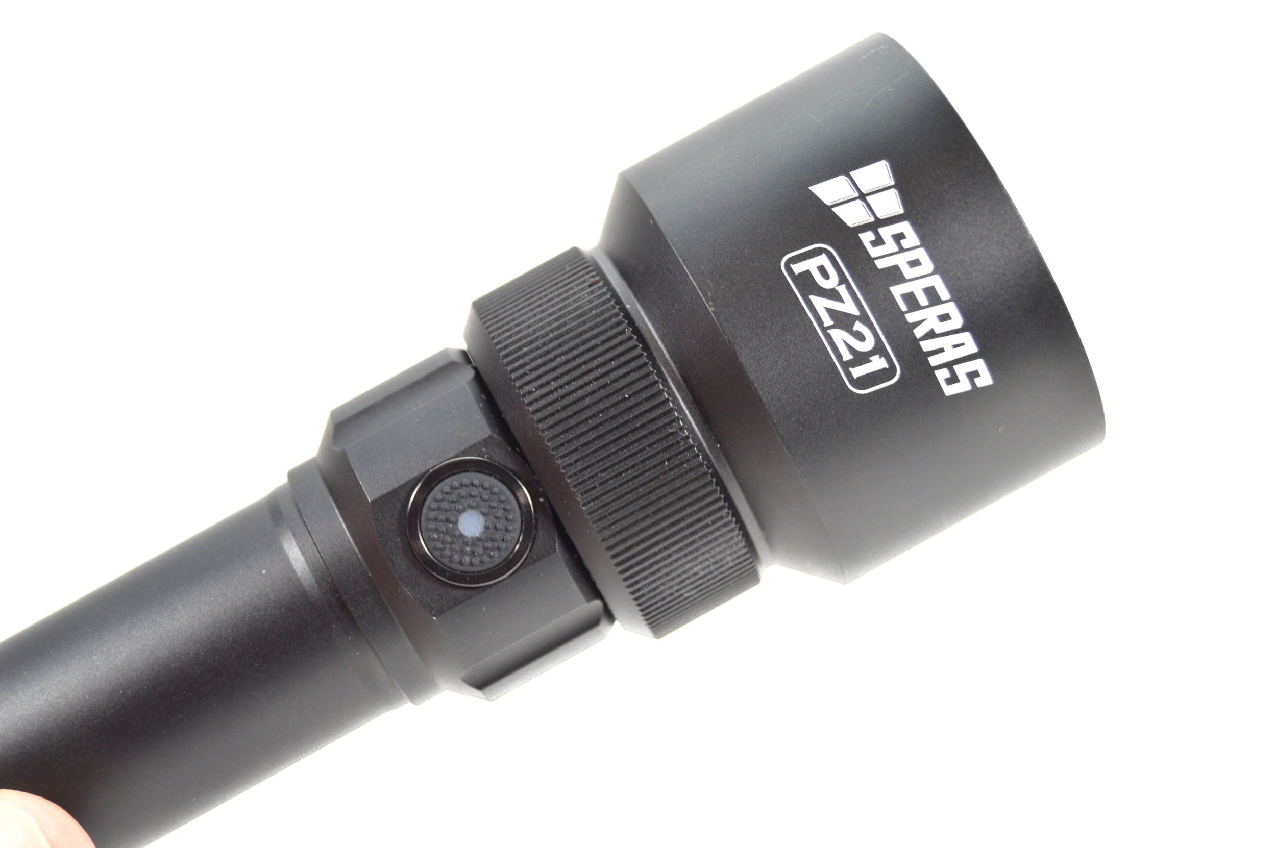 SPERAS PZ21 zoom hunting flashlight showing the rotating focus mechanism and side switch button