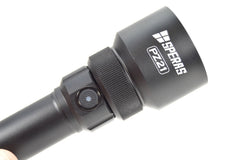 SPERAS PZ21 zoom hunting flashlight showing the rotating focus mechanism and side switch button